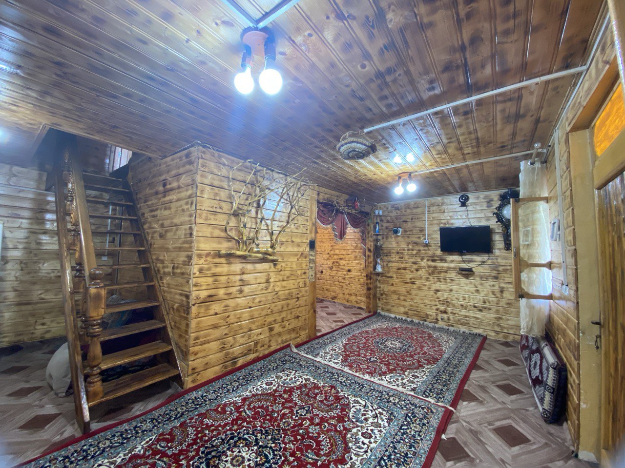 کلبه چوبی عمو کوروش